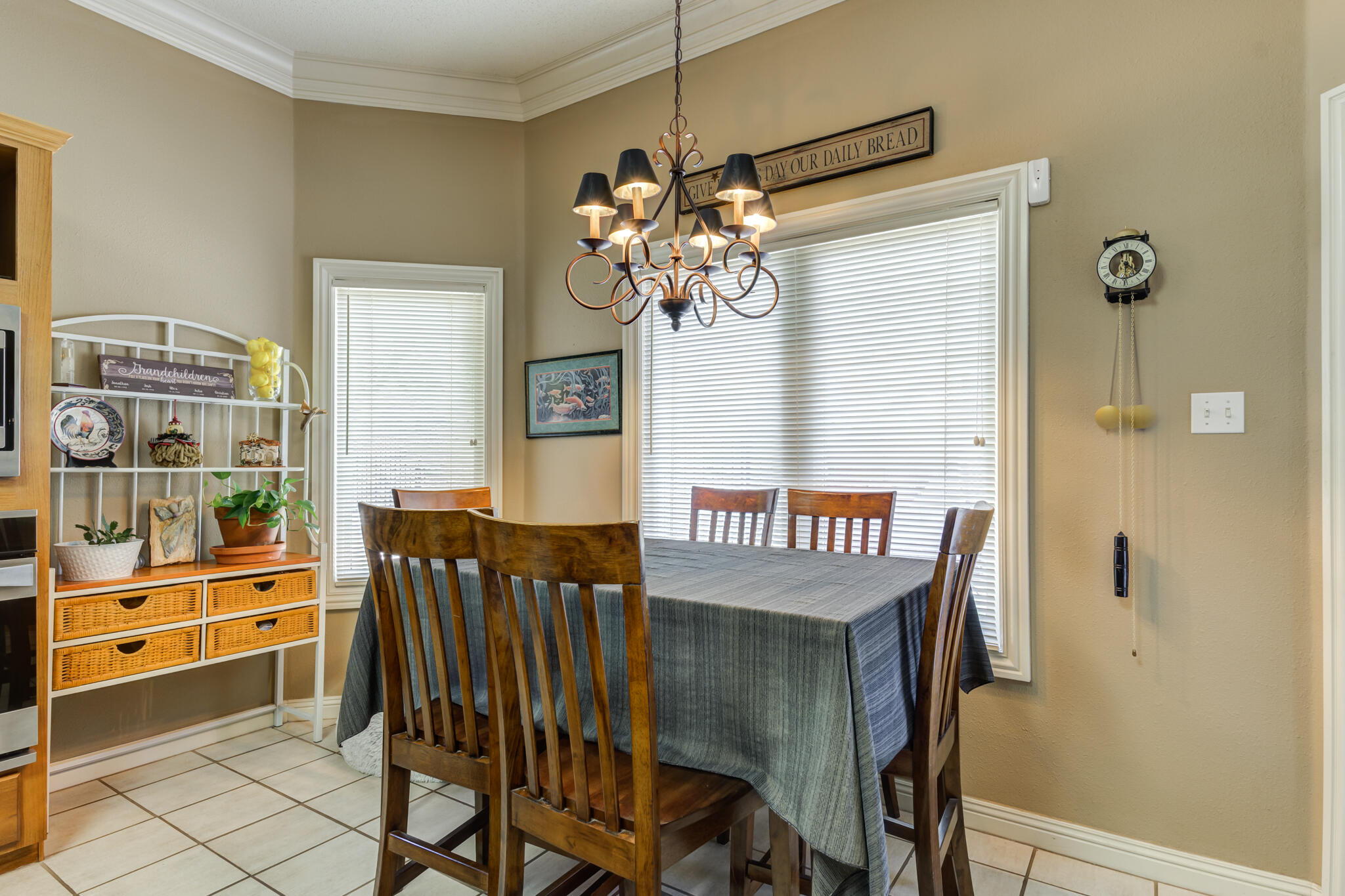 30 West Lakeshore Drive Ransom Canyon, TX 79366 - Photo 22 of 58 a view of a dining room with furniture and chandelier