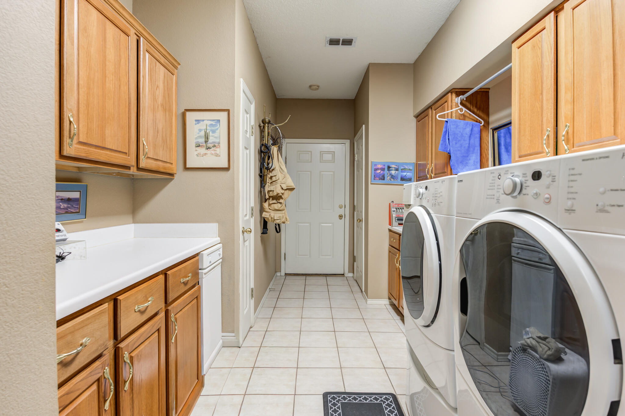 30 West Lakeshore Drive Ransom Canyon, TX 79366 - Photo 40 of 58 a view of a kitchen with refrigerator and washer