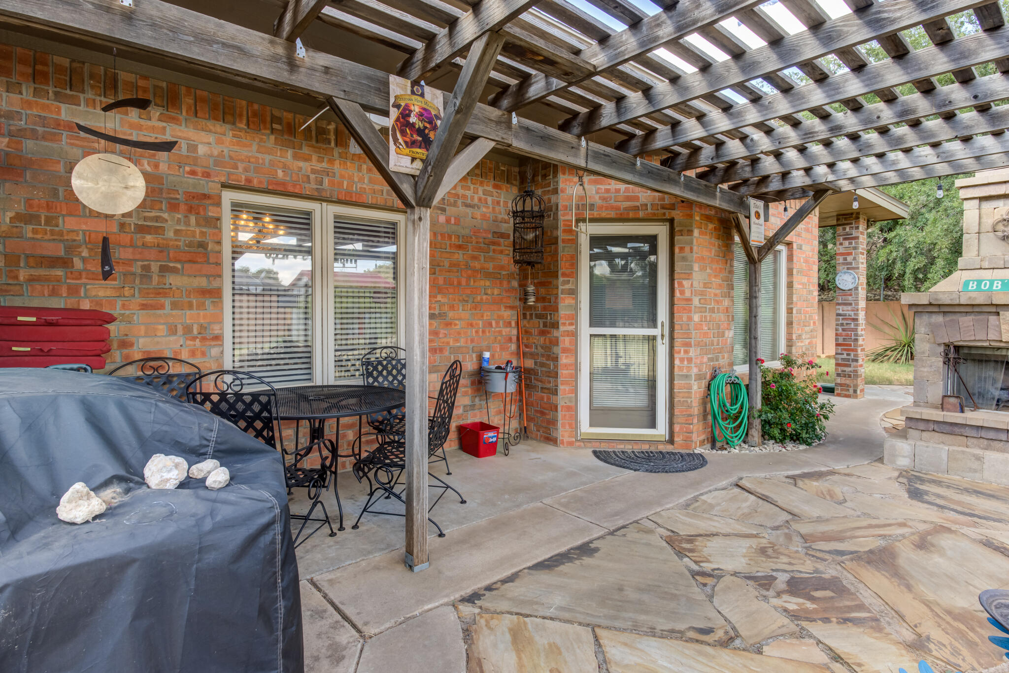 30 West Lakeshore Drive Ransom Canyon, TX 79366 - Photo 52 of 58 a front view of a house with outdoor seating