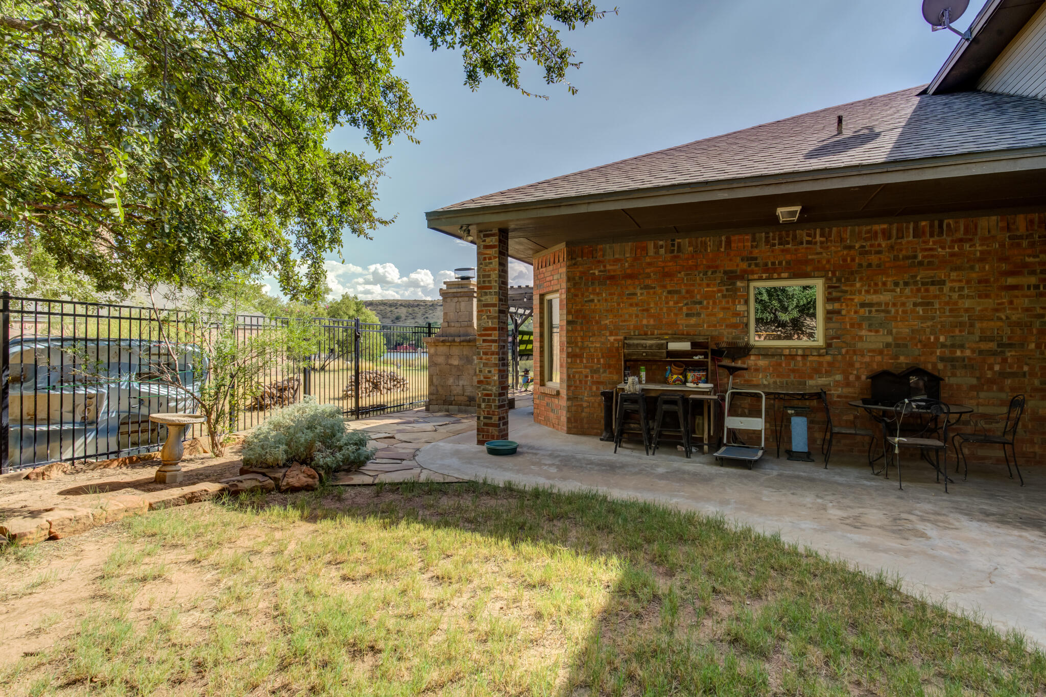 30 West Lakeshore Drive Ransom Canyon, TX 79366 - Photo 57 of 58 a view of a house with patio area and dining area