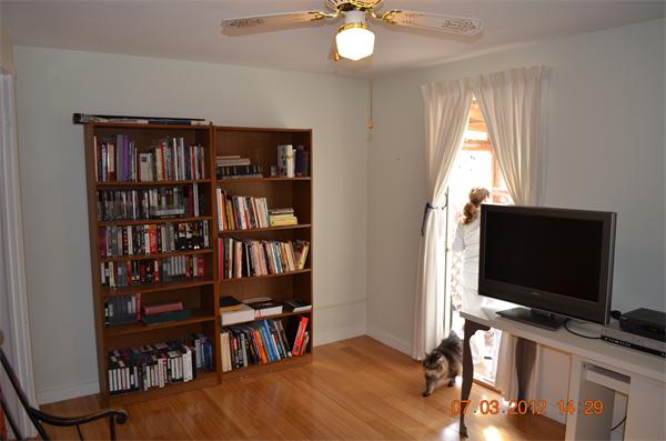 119 Thresher Road Hampden, MA 01036 - Photo 14 of 22 a living room with television and a flat screen tv