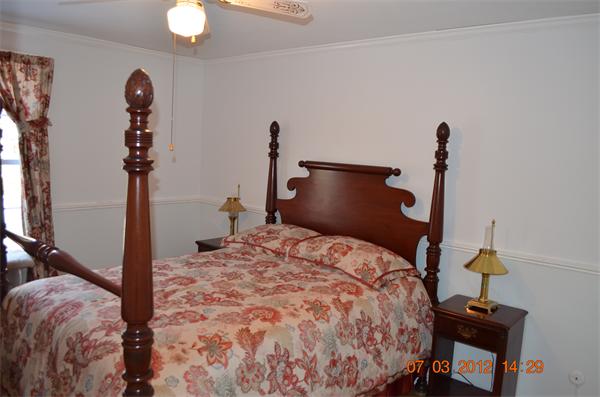 119 Thresher Road Hampden, MA 01036 - Photo 16 of 22 a bedroom with bed and flowerpot