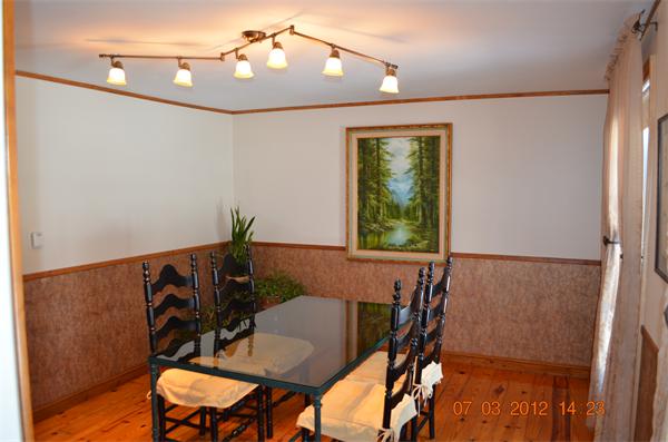 119 Thresher Road Hampden, MA 01036 - Photo 4 of 22 a view of a dining room with furniture and a chandelier