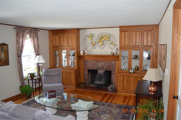 119 Thresher Road Hampden, MA 01036 - Photo 6 of 22 a living room with furniture and a fireplace
