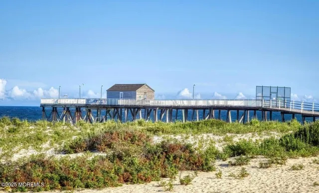 a view of a swimming pool with a lake view