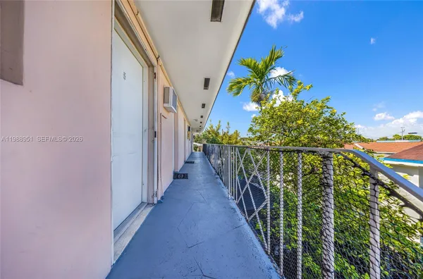 a side view of a house with wooden stairs