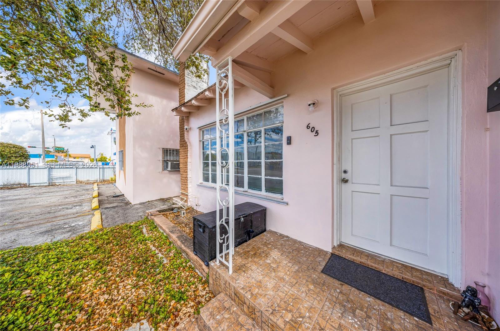 605 Northwest 34th Avenue Miami, FL 33125 - Photo 34 of 49 a view of a house with backyard porch and sitting area