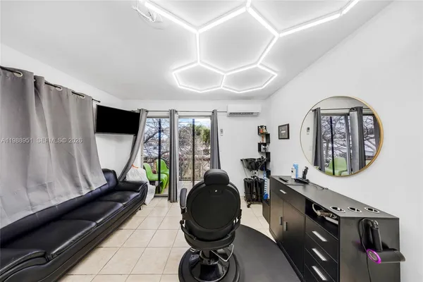 a room with furniture and a window