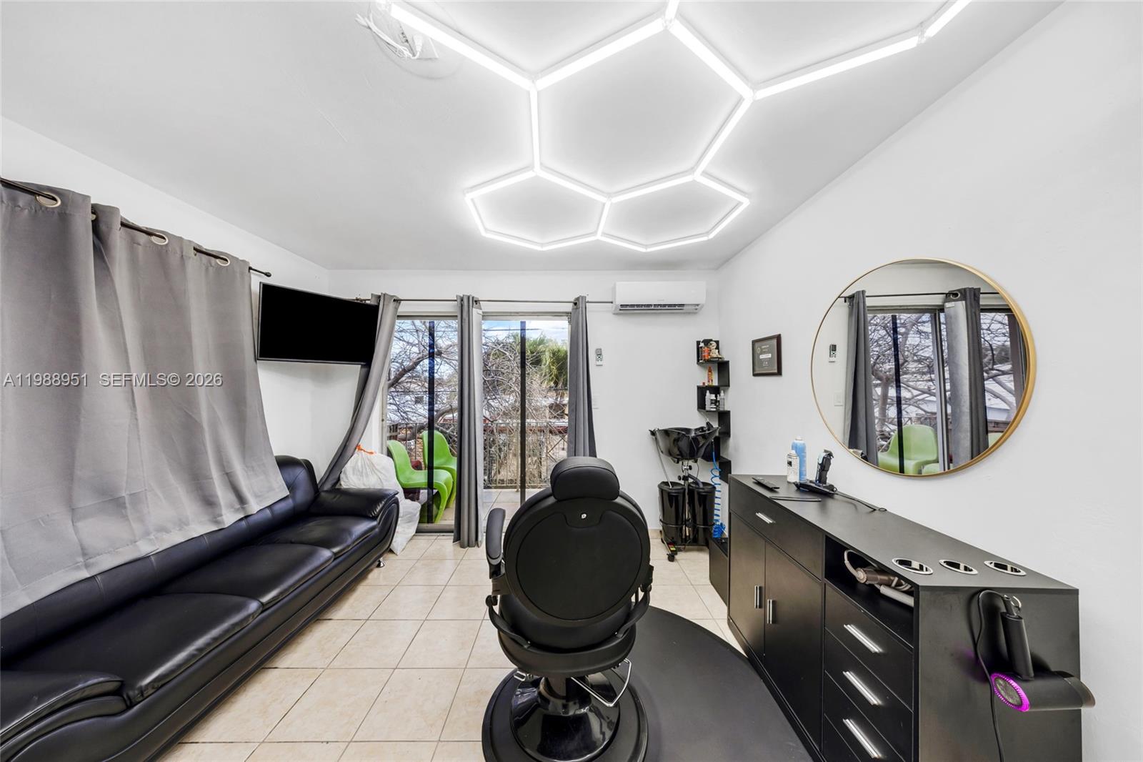 605 Northwest 34th Avenue Miami, FL 33125 - Photo 37 of 49 a view of a room with workspace and windows