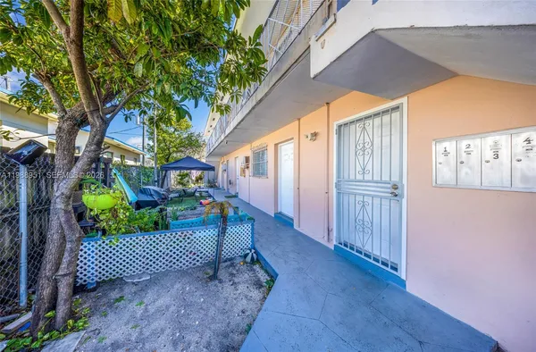 a view of porch with a yard
