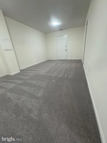 a view of storage and utility room with washer and dryer