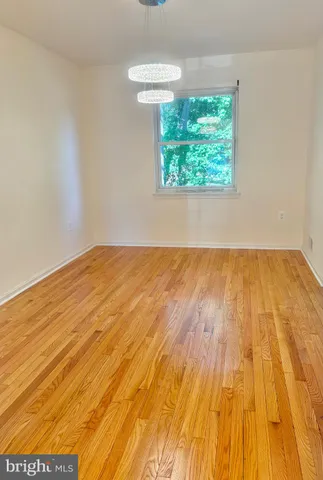 a kitchen with cabinets appliances and a sink