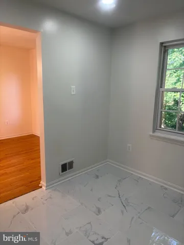 a white refrigerator freezer sitting in a kitchen