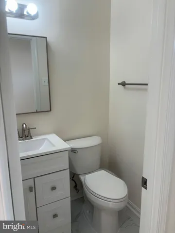 a view of staircase with rug