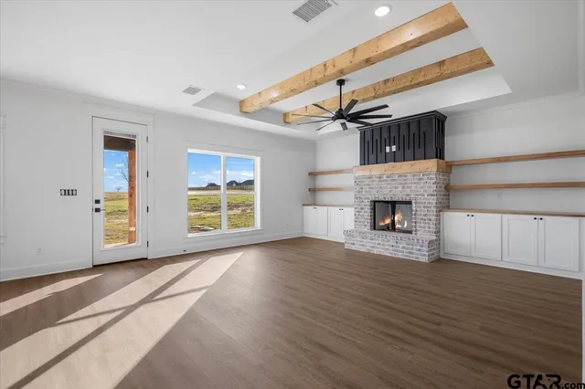 a view of a kitchen with a sink and a window