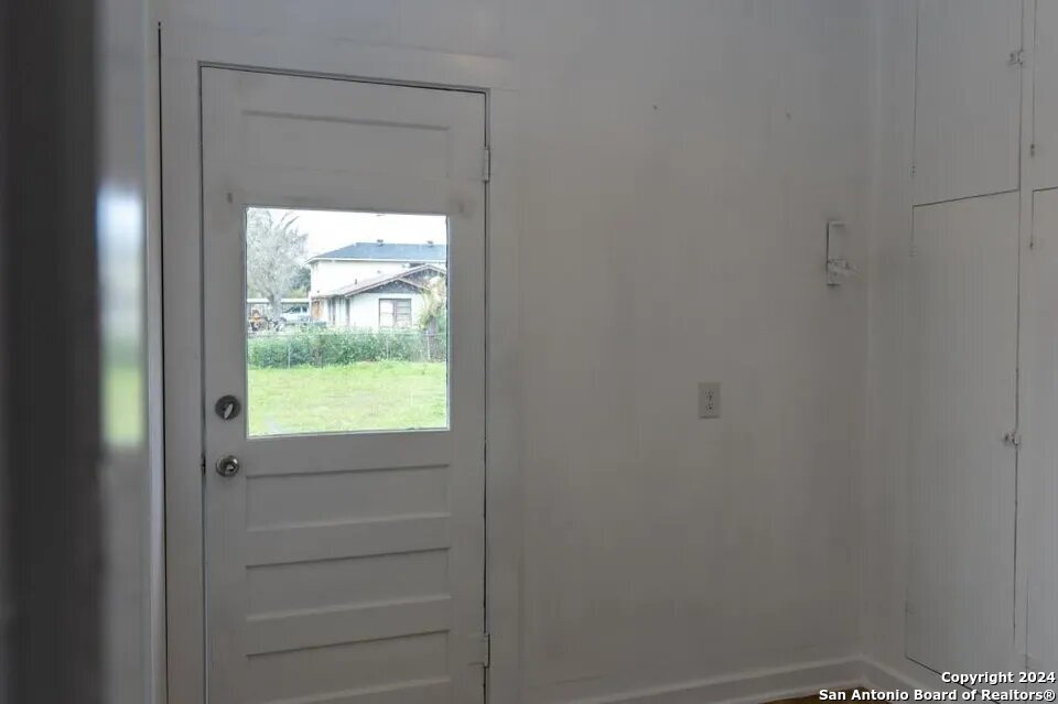 719 Kelly Street Poteet, TX 78065 - Photo 12 of 12 a view of an front door