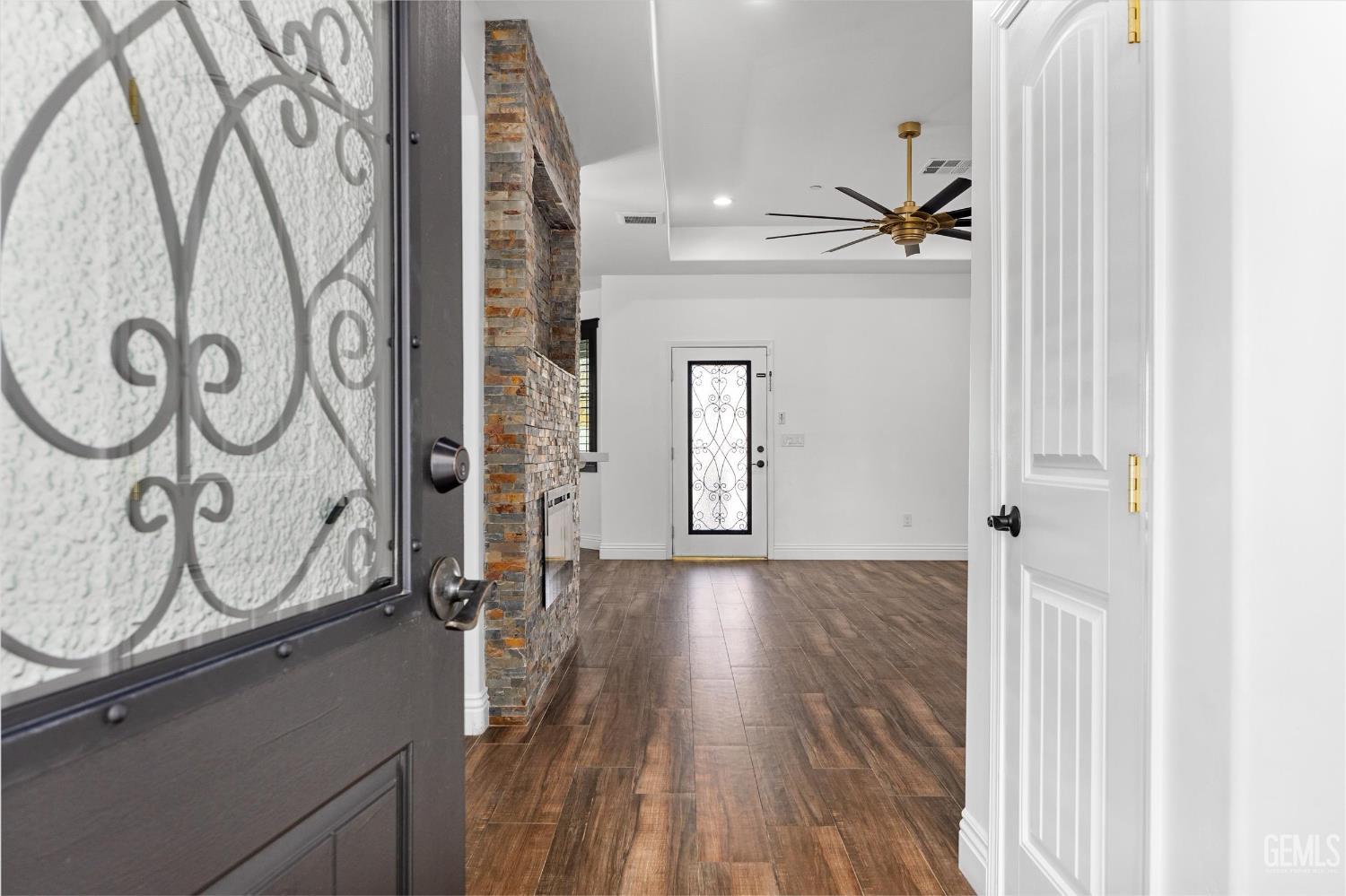 Undisclosed Address Tehachapi, CA 93561 - Photo 16 of 62 a view of an entryway with wooden floor