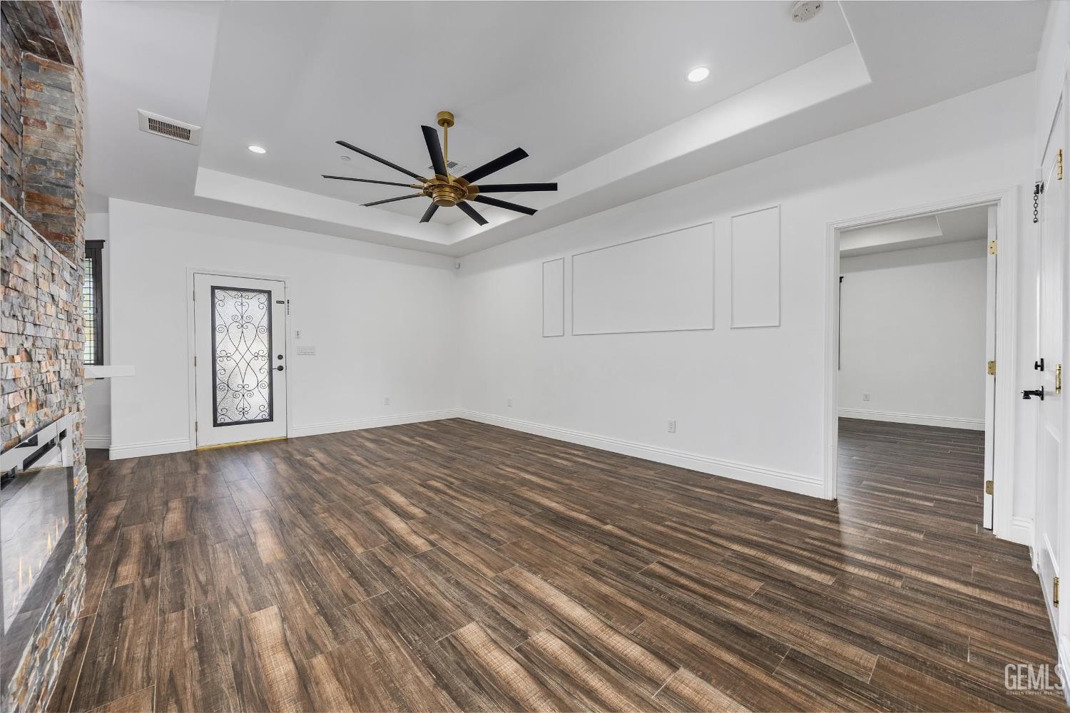 Undisclosed Address Tehachapi, CA 93561 - Photo 18 of 62 wooden floor in an empty room with a window