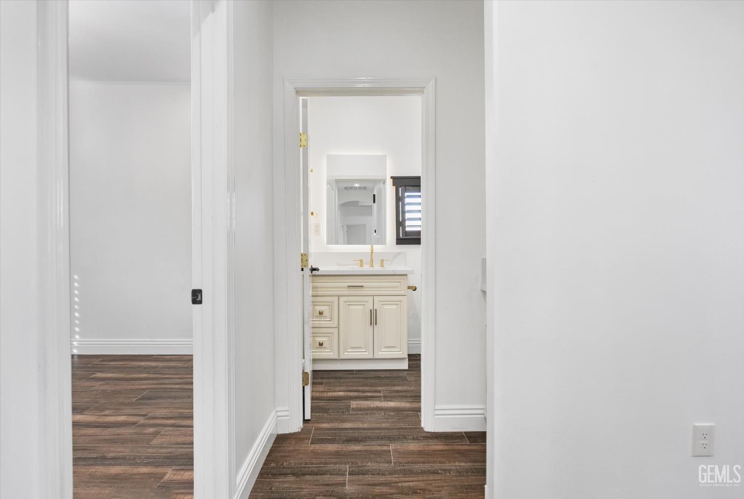 Undisclosed Address Tehachapi, CA 93561 - Photo 46 of 62 a view of a hallway with wooden floor