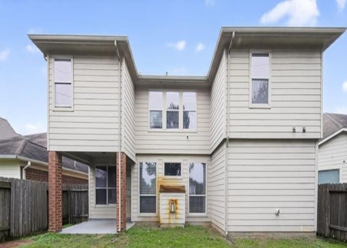 4922 Redwing Brook Trail Katy, TX 77449 - Photo 2 of 22 a front view of a house with a yard