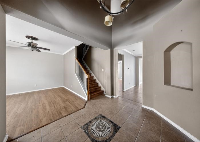 4922 Redwing Brook Trail Katy, TX 77449 - Photo 4 of 22 wooden floor with an entryway