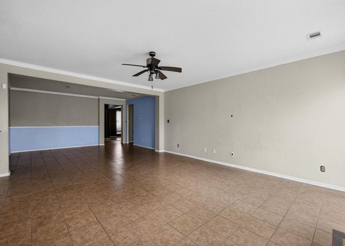 4922 Redwing Brook Trail Katy, TX 77449 - Photo 7 of 22 a view of an empty room with a window