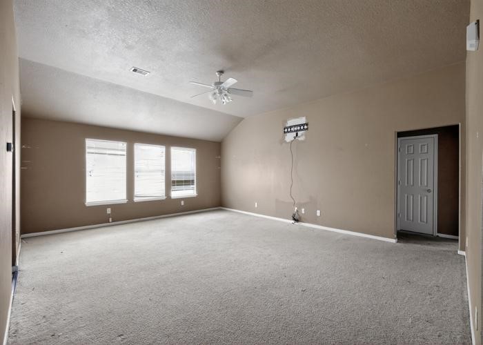 4922 Redwing Brook Trail Katy, TX 77449 - Photo 10 of 22 a view of an empty room with a window
