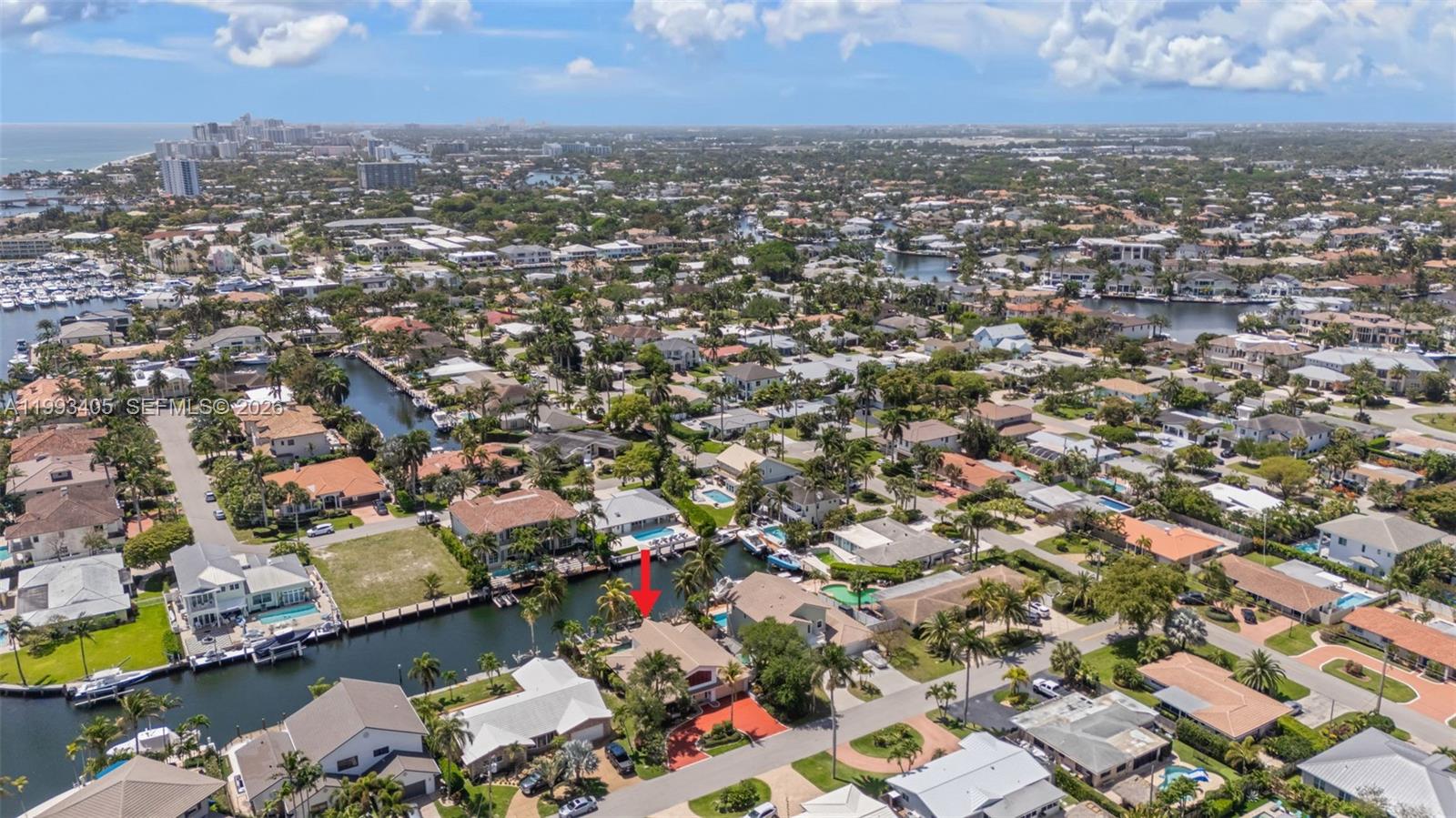 2858 Northeast 33rd Street Lighthouse Point, FL 33064 - Photo 17 of 24 an aerial view of a city with lots of residential buildings