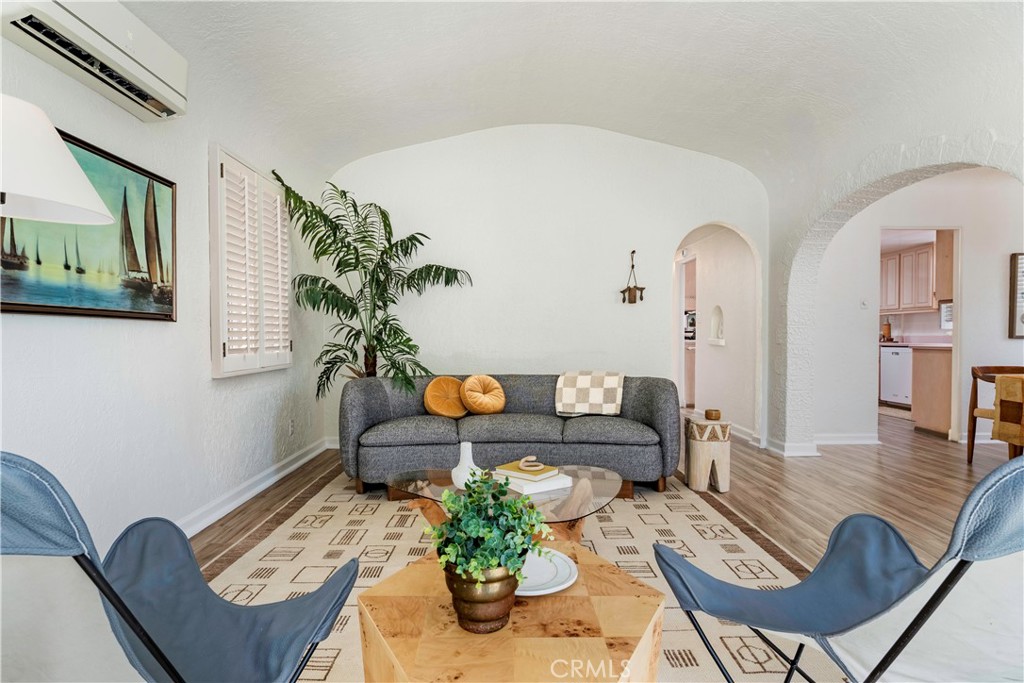 143 Roycroft Avenue Long Beach, CA 90803 - Photo 9 of 45 a living room with furniture flowerpot and wooden floor