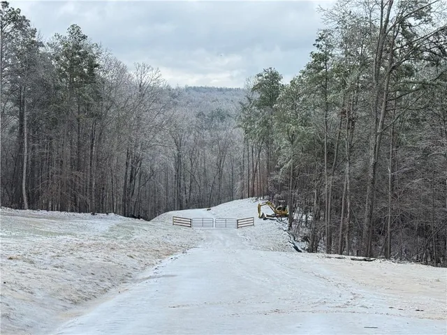a view of a backyard of the house