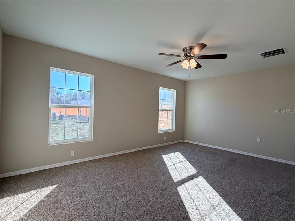 14656 Southwest 21st Place Ocala, FL 34481 - Photo 18 of 52 a view of an empty room with a window