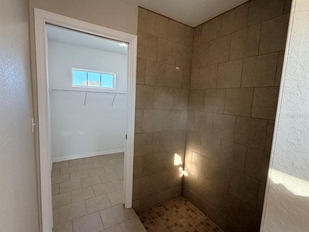 14656 Southwest 21st Place Ocala, FL 34481 - Photo 23 of 52 a bathroom with a shower
