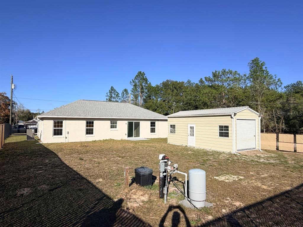 14656 Southwest 21st Place Ocala, FL 34481 - Photo 38 of 52 a view of a house with backyard