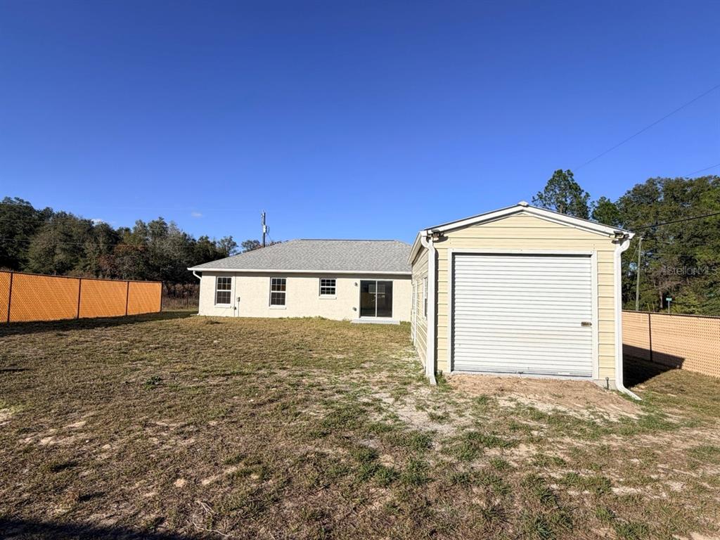14656 Southwest 21st Place Ocala, FL 34481 - Photo 48 of 52 a view of a house with a outdoor space