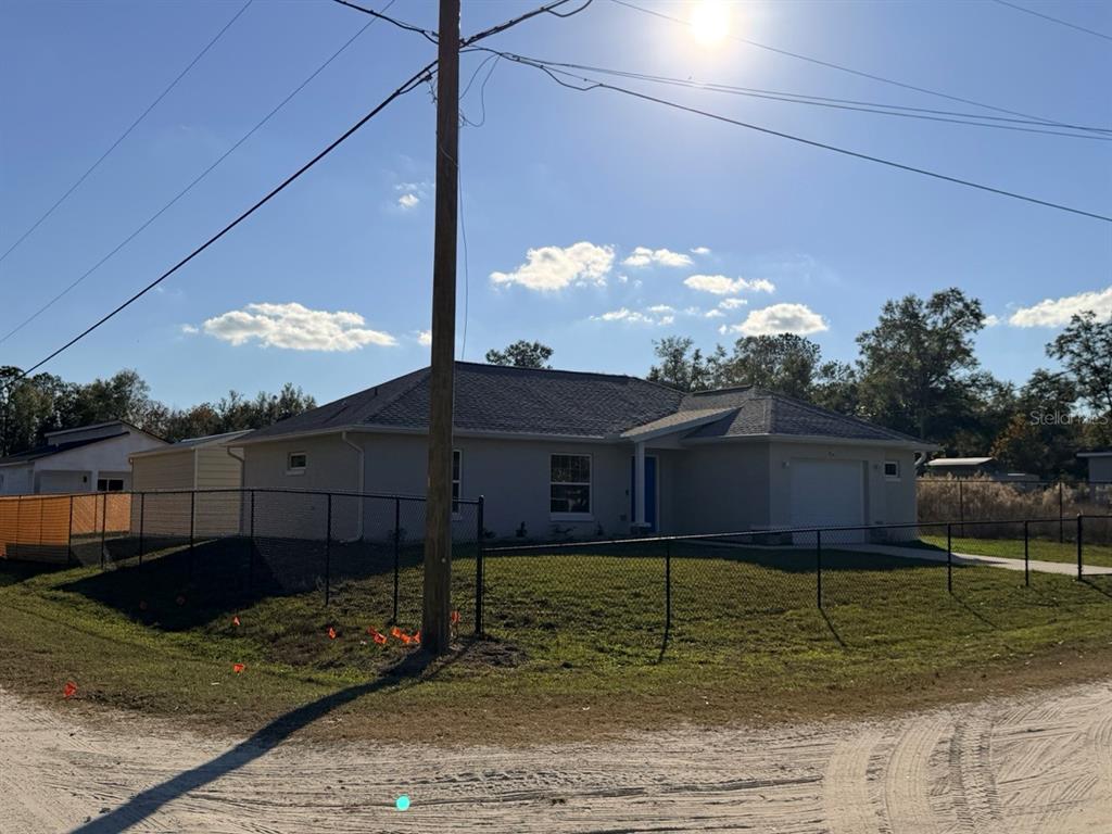 14656 Southwest 21st Place Ocala, FL 34481 - Photo 51 of 52 a view of a house with a yard