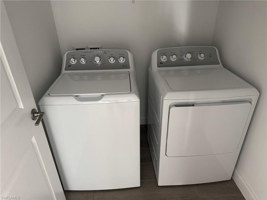 18227 Ridgeline Drive Estero, FL 33928 - Photo 17 of 30 a utility room with dryer and washer