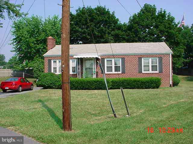 527 Applecroft Road Winchester, VA 22601 - Photo 1 of 1 a view of a house with a yard and potted plants