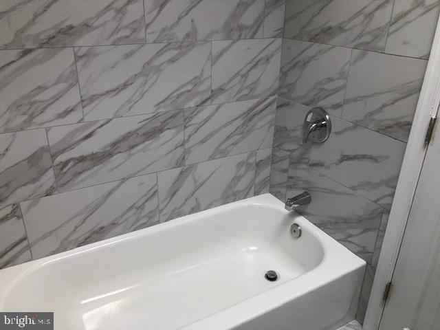 6630 North Broad Street Philadelphia, PA 19126 - Photo 5 of 12 a bathroom with a tub