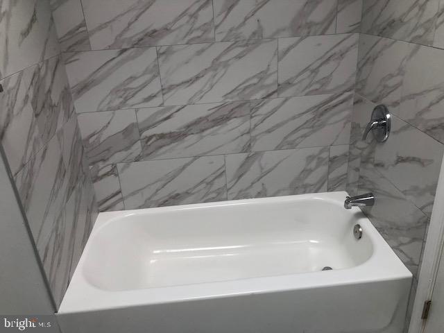 6630 North Broad Street Philadelphia, PA 19126 - Photo 6 of 12 a bathroom with a bathtub