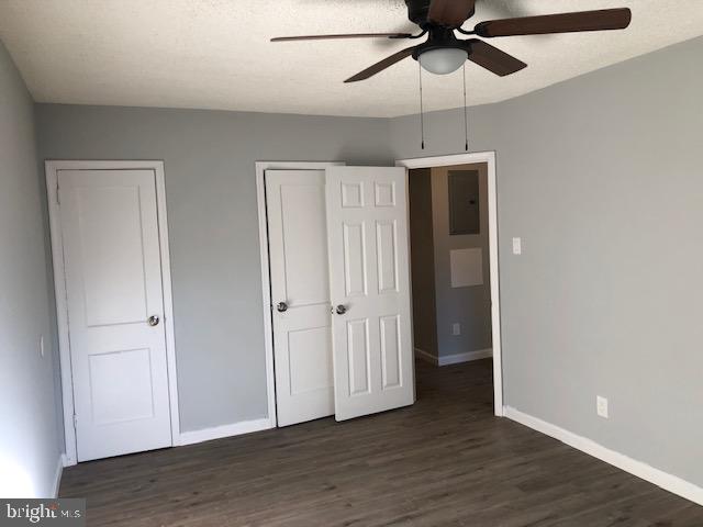 6630 North Broad Street Philadelphia, PA 19126 - Photo 8 of 12 a view of an empty room with wooden floor and a ceiling fan