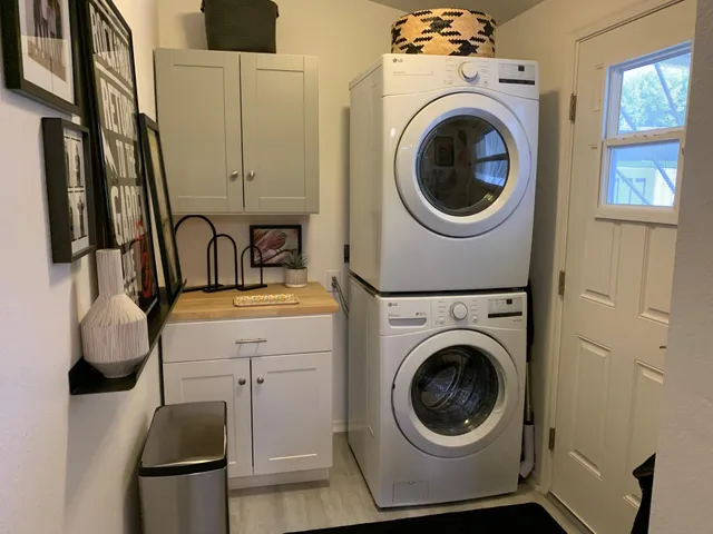a utility room with dryer and washer