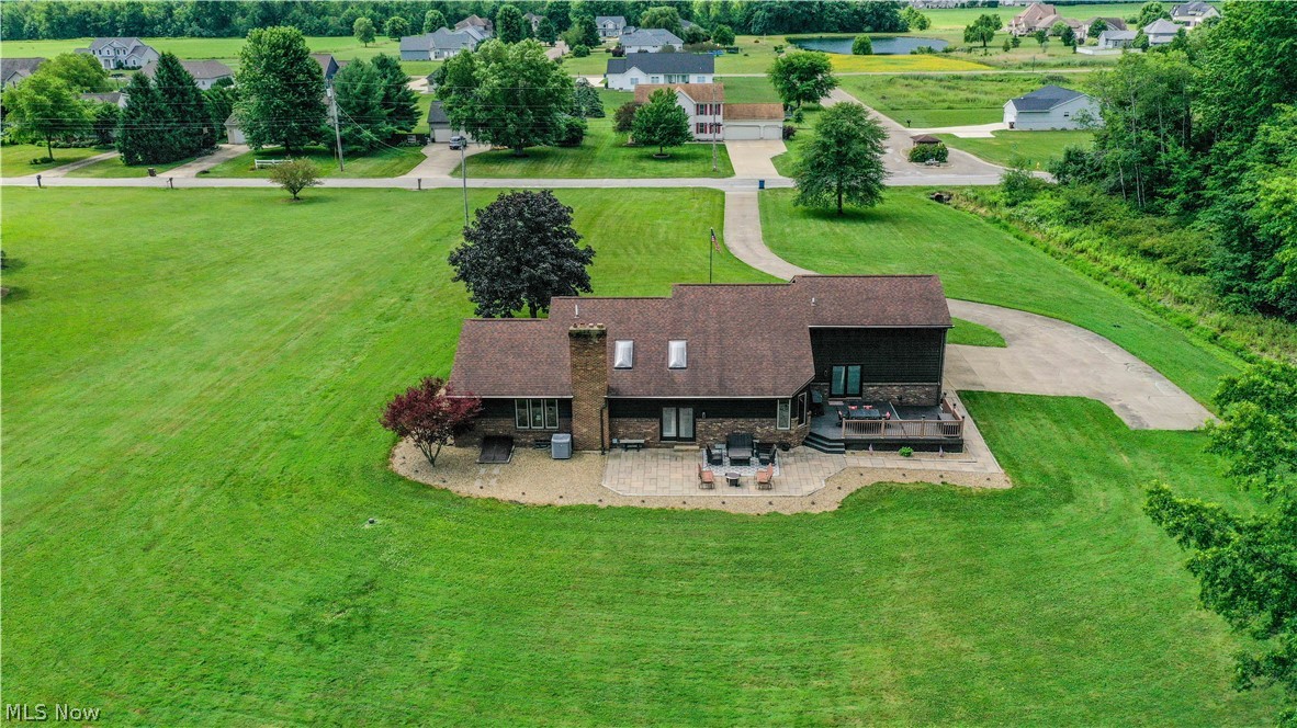 405 Airport Road Northwest Warren, OH 44481 - Photo 47 of 50 Residence featuring a multi-level deck and a separate paved patio area