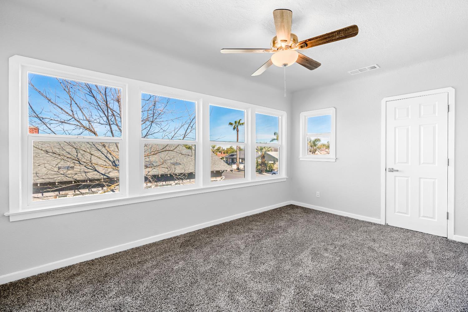 1249 D Street Reedley, CA 93654 - Photo 29 of 40 a view of an empty room with a window