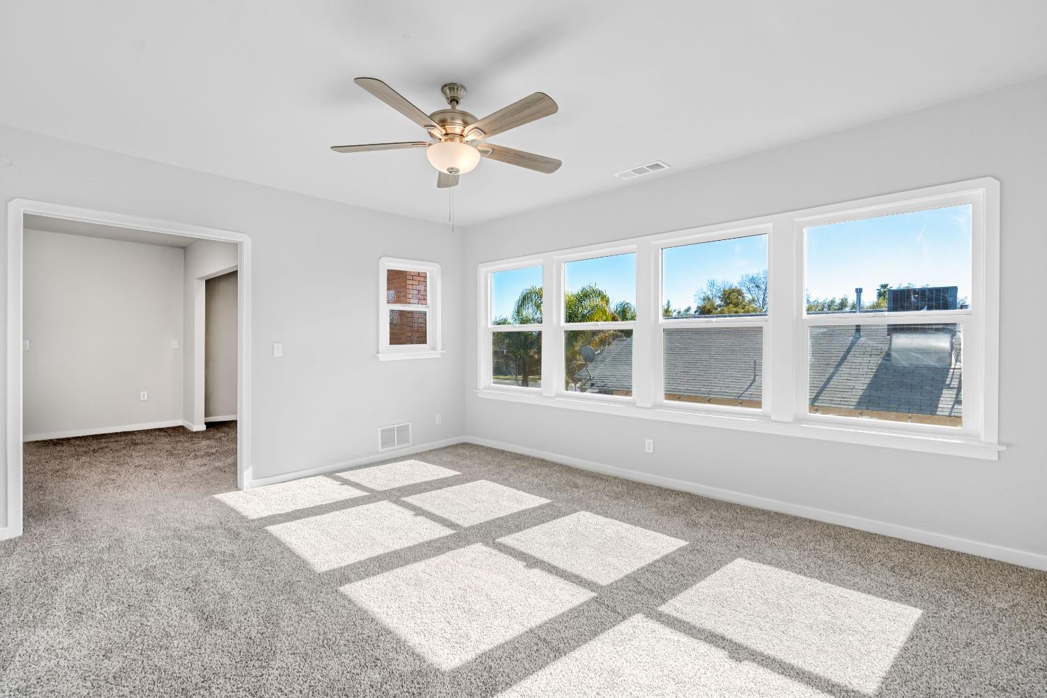1249 D Street Reedley, CA 93654 - Photo 31 of 40 a view of an empty room with a window