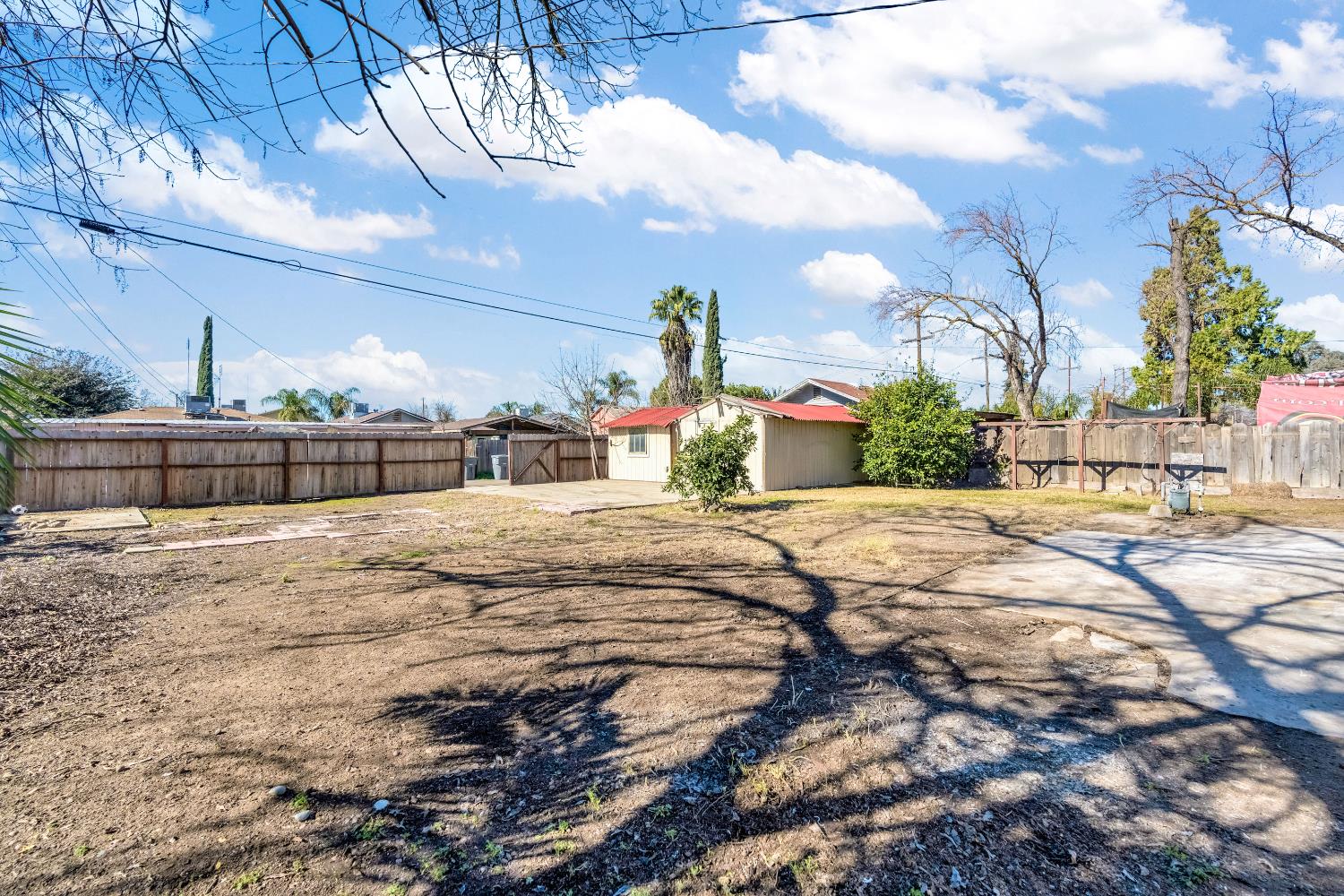 1249 D Street Reedley, CA 93654 - Photo 38 of 40 a view of a backyard of the house