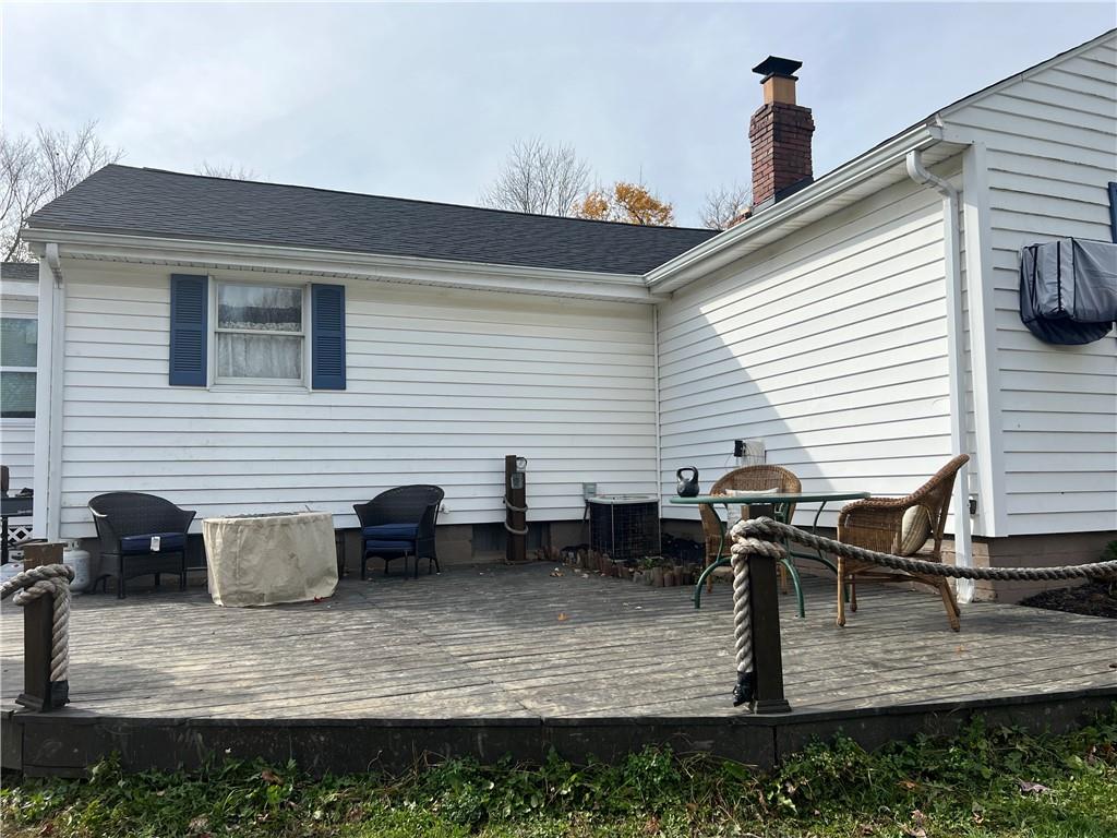 1061 Rutledge Road Transfer, PA 16154 - Photo 4 of 23 a view of two chairs and table in the patio