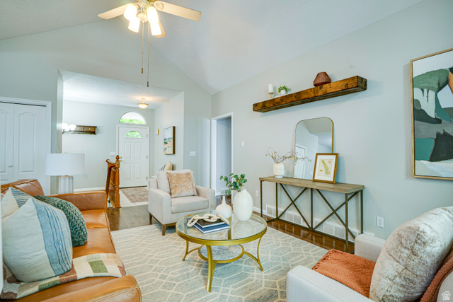 1433 Forge Way Draper, UT 84020 - Photo 8 of 29 Vaulted ceilings defining a living space with wood-finish flooring