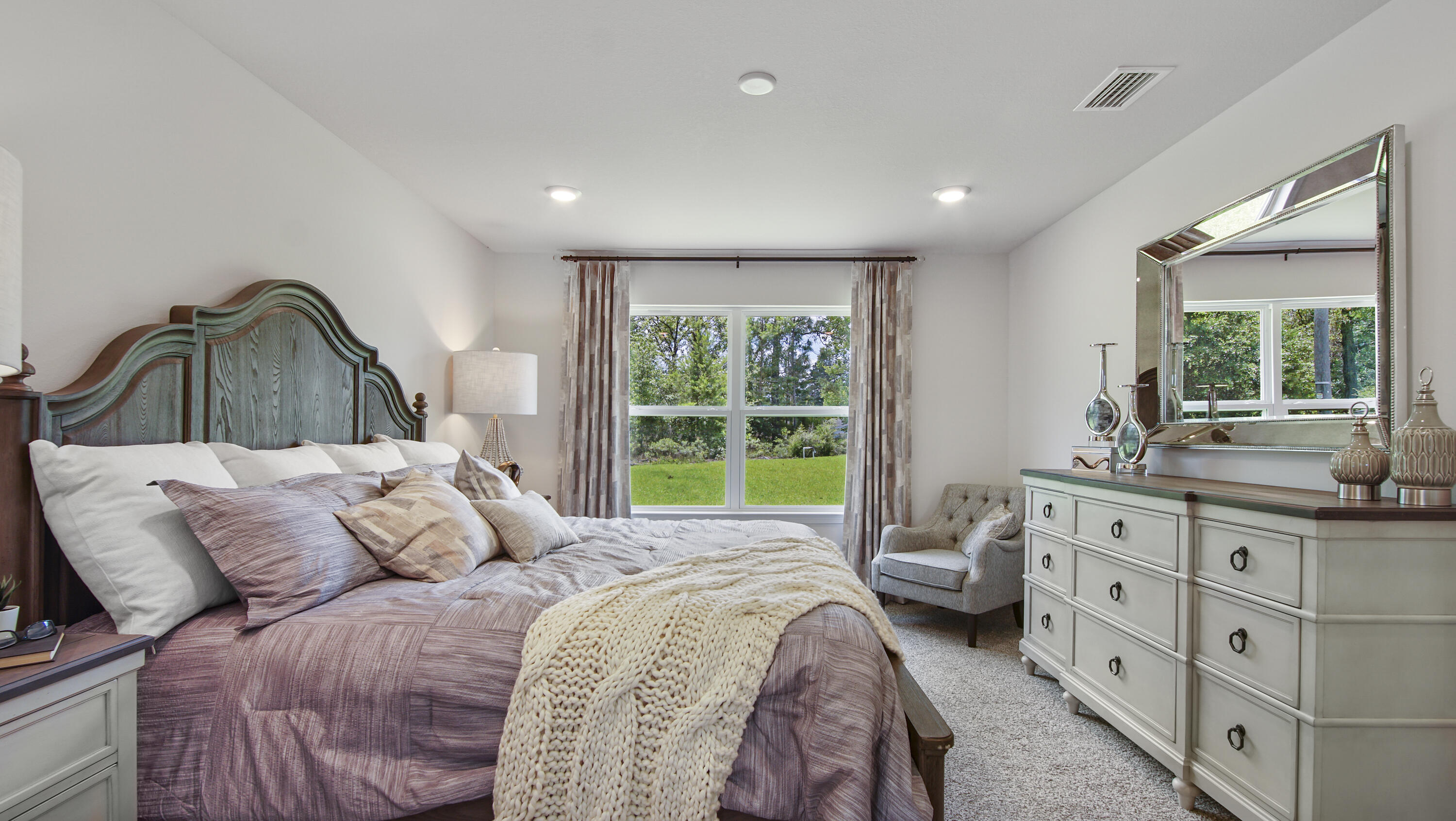 204 Gray Owl Drive Freeport, FL 32439 - Photo 14 of 35 a spacious bedroom with a large bed and a window