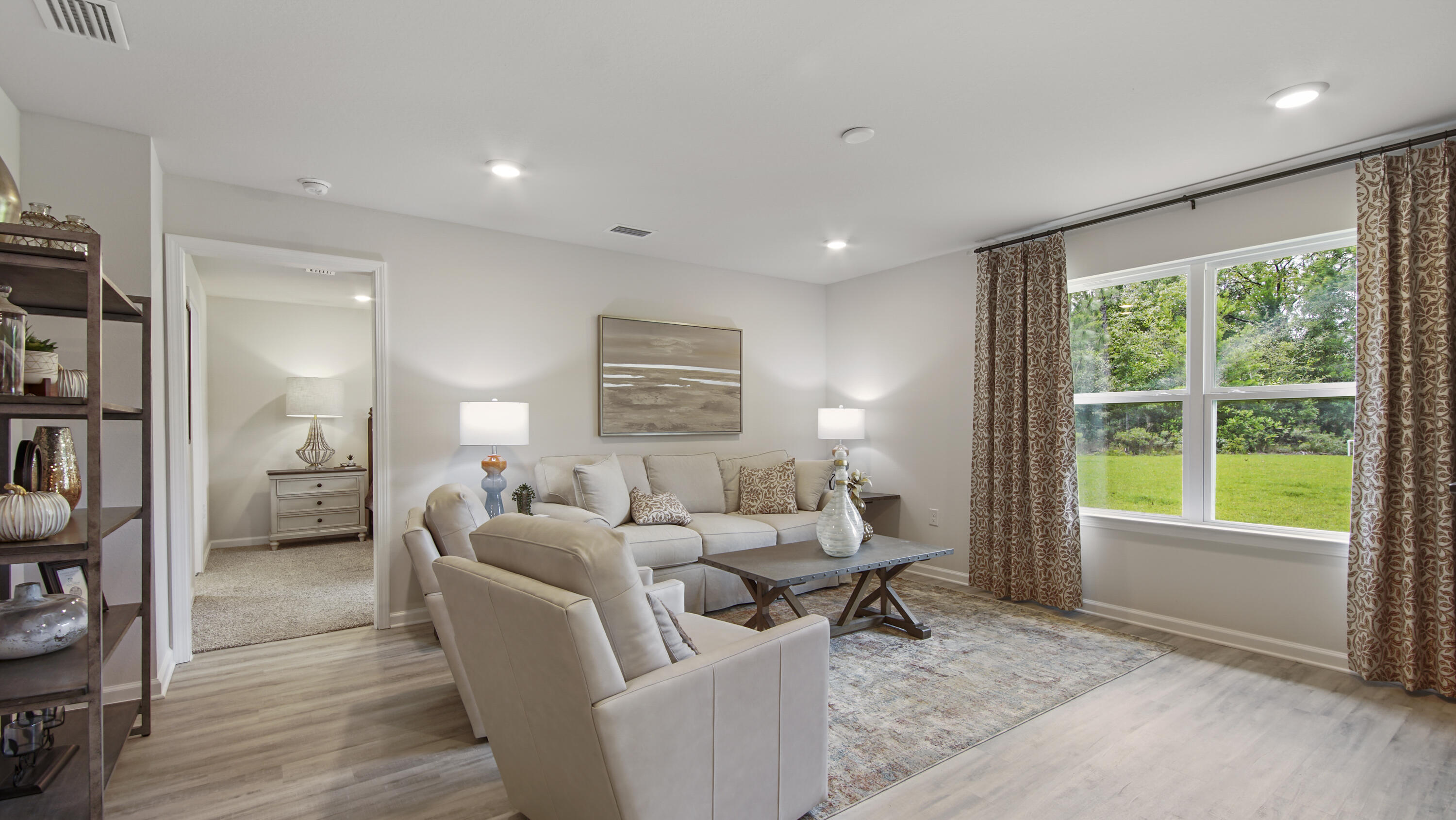 204 Gray Owl Drive Freeport, FL 32439 - Photo 9 of 35 a living room with furniture and a window