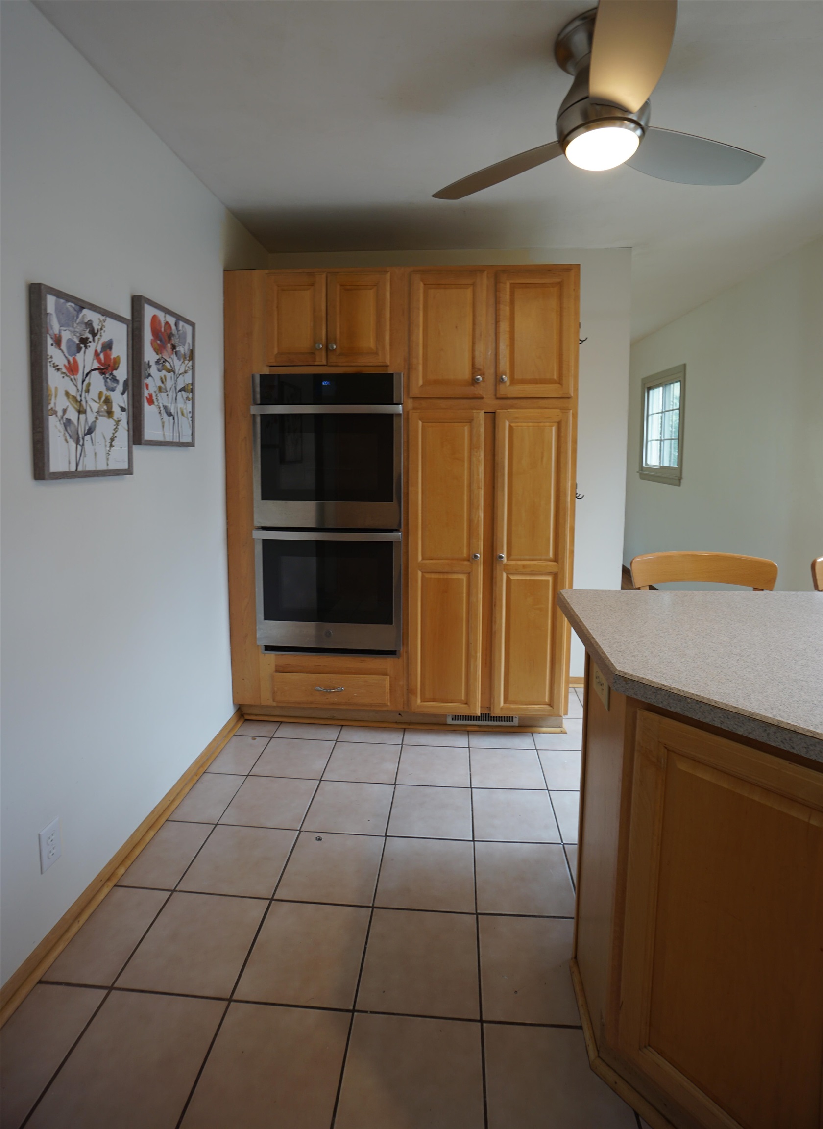4819 Highcrest Road Rockford, IL 61107 - Photo 12 of 31 a kitchen with a sink and a refrigerator